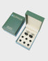 Cufflink set in an open box with &
