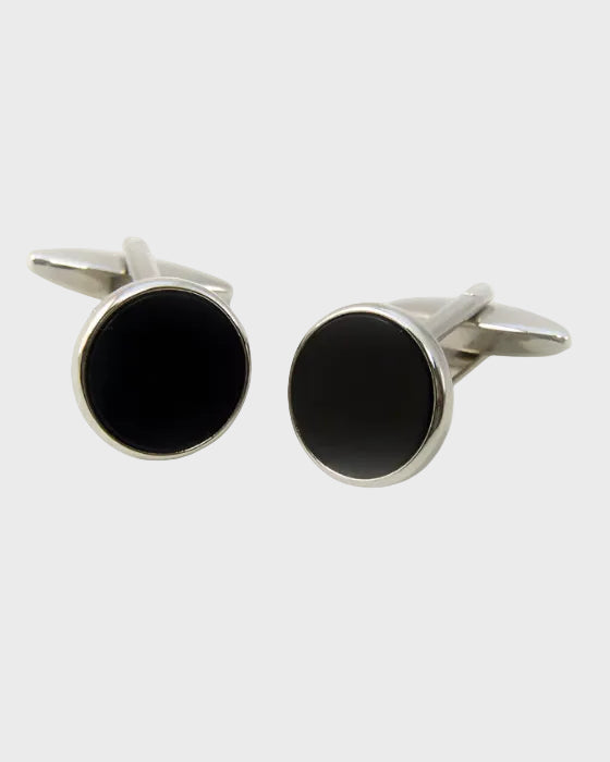 Pair of black round cufflinks with silver borders on a white background