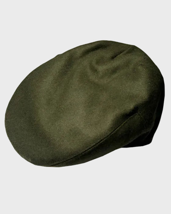 Olive flat cap on a light gray background