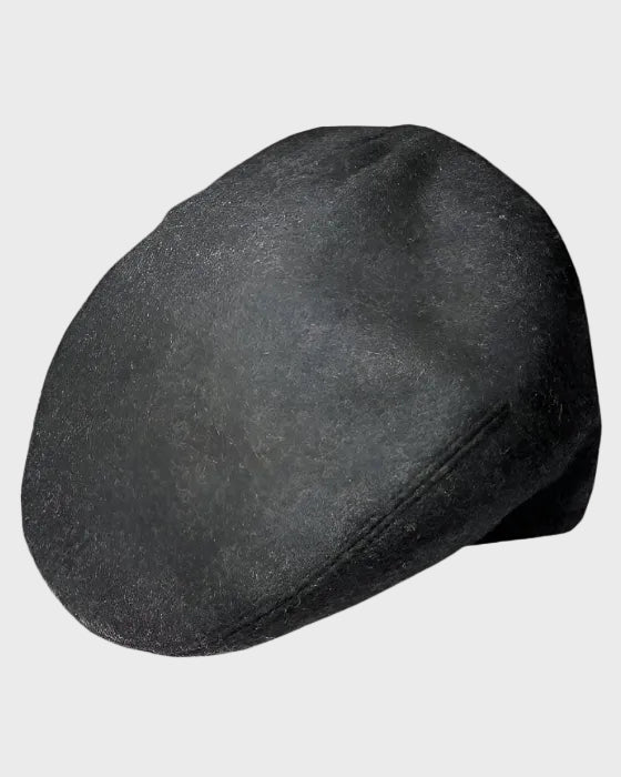 Flat cap on a light gray background