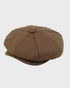 Brown cap on a light gray background