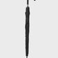 Black umbrella on a light gray background