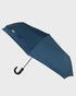 Blue umbrella on a light gray background