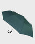 Green umbrella on a light gray background