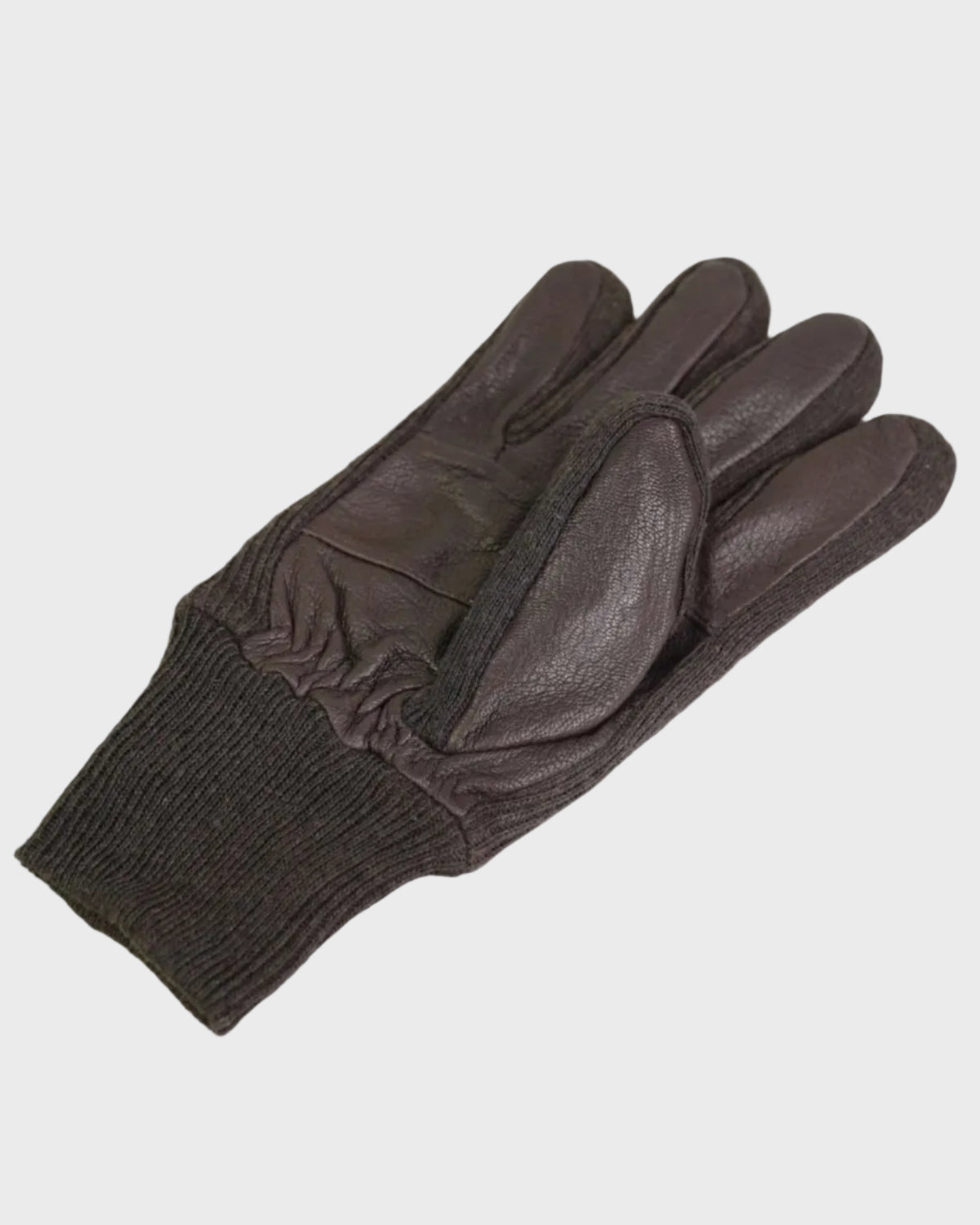 Brown leather glove on a light gray background