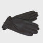 Pair of leather gloves on a light gray background
