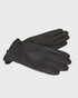 Pair of leather gloves on a light gray background