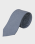 Rolled-up linen tie on a light gray background