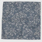 Light blue fabric with a white leaf pattern