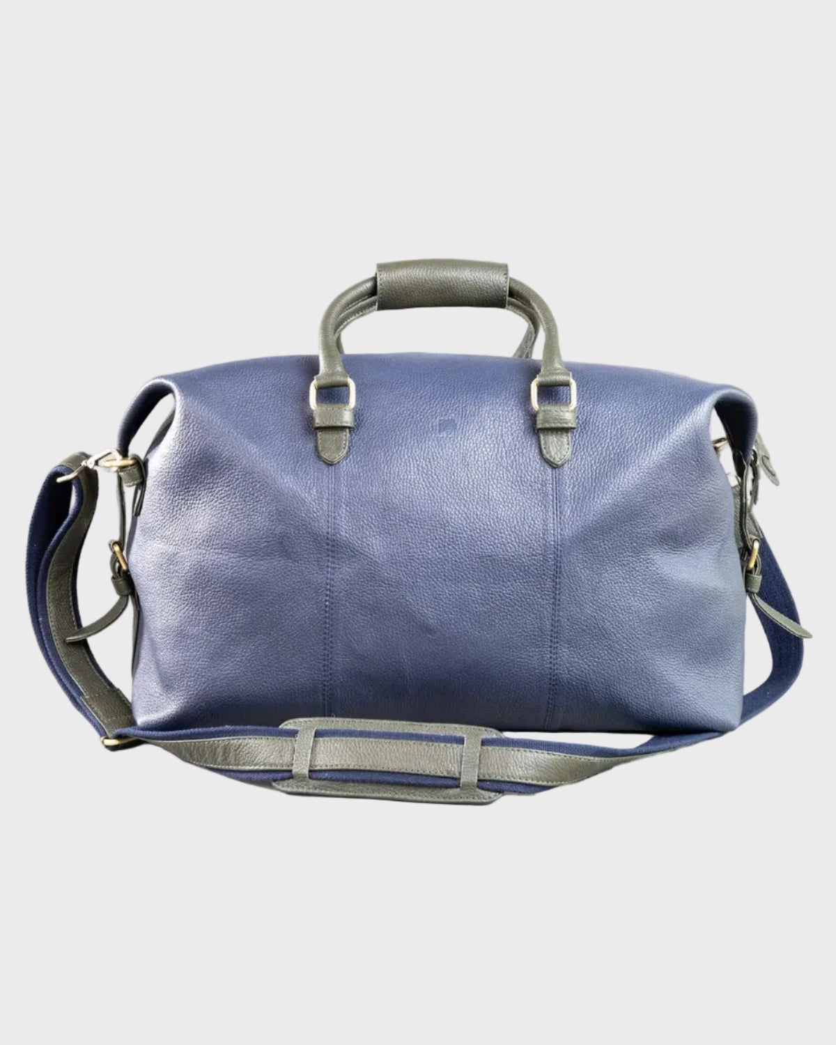 Navy leather holdall with gray straps on a light gray background