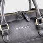 Black leather bag with gold accents and 'SOPHOS' branding on a light gray background