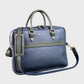 Blue briefcase with green straps on a light grey background
