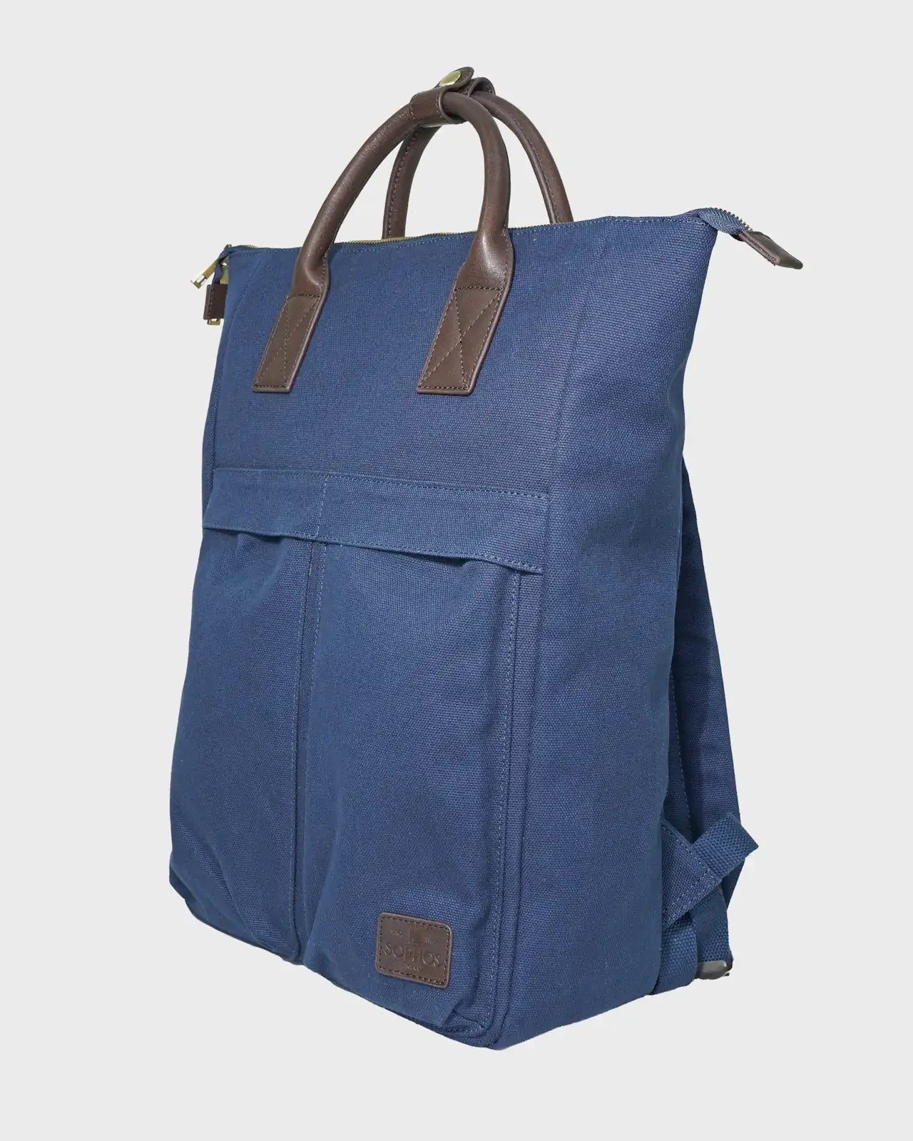 Navy backpack with brown handles on a light gray background