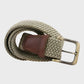 woven belt with a brass buckle on a light gray background