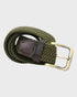 Khaki woven belt with a brass buckle on a light gray background