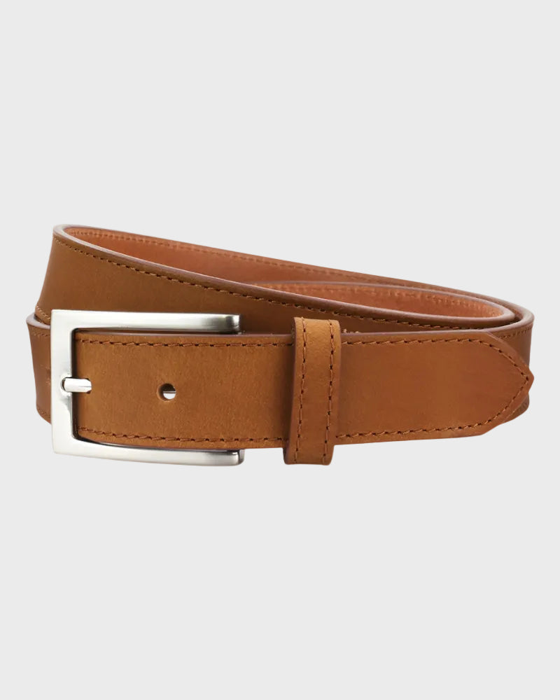 Tan leather belt with a silver buckle on a light gray background