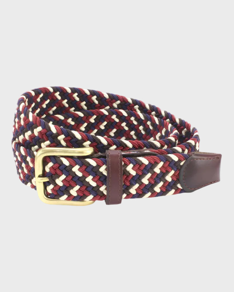 Woven belt with a brass buckle on a light gray background