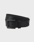 Black leather belt on a light gray background