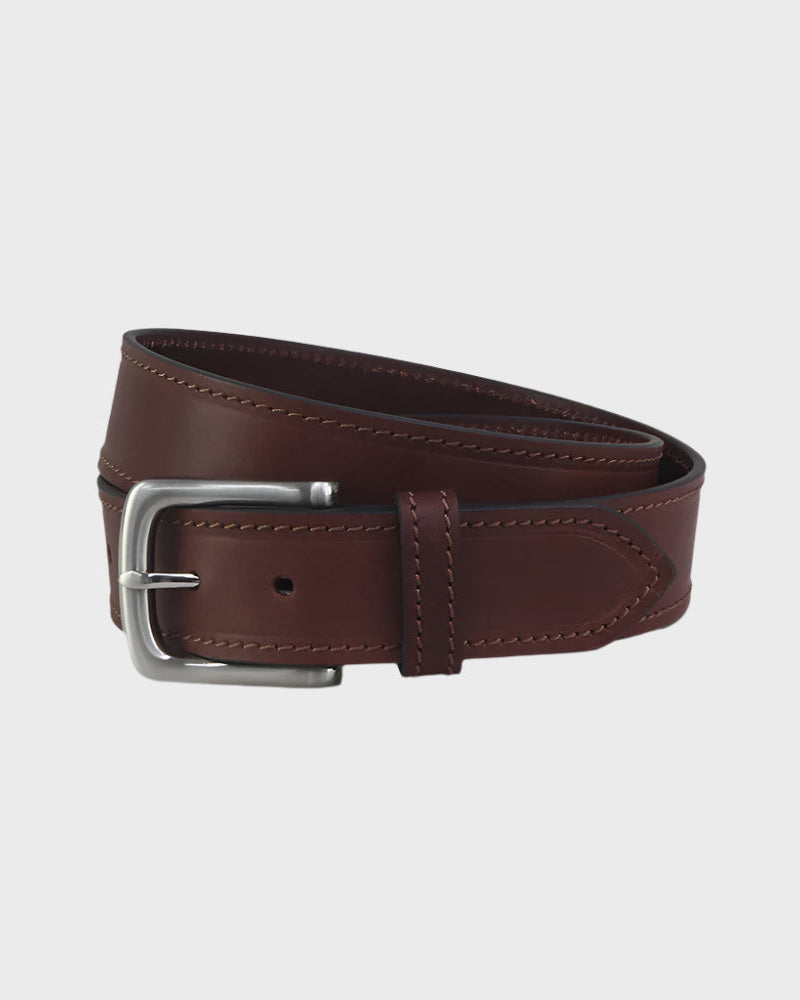 Brown leather belt on a light gray background