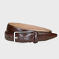 Brown leather belt with a silver buckle on a light gray background