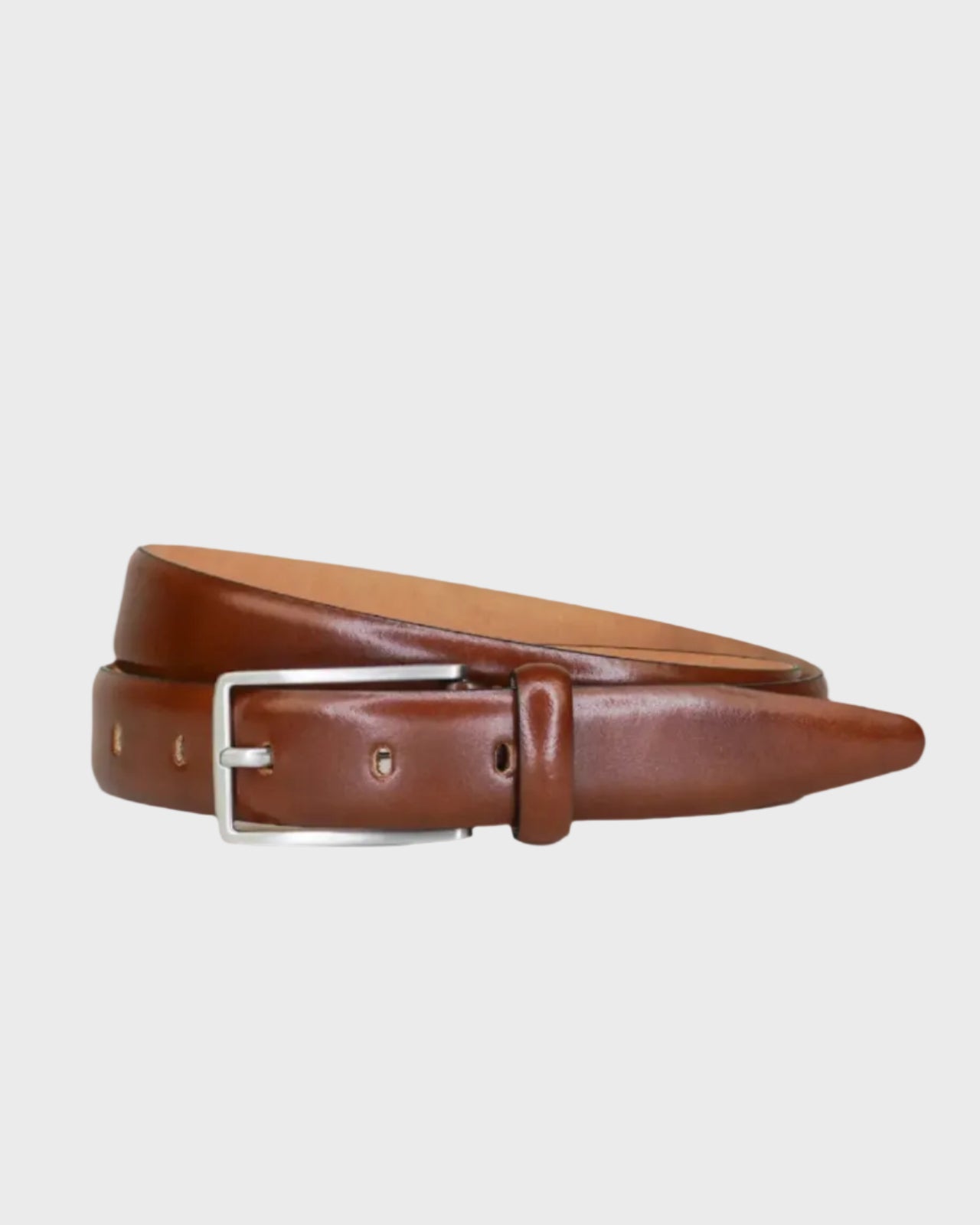 Tan leather belt with a silver buckle on a light gray background
