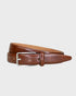 Tan leather belt with a silver buckle on a light gray background