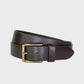 Brown leather belt with a brass buckle on a light gray background