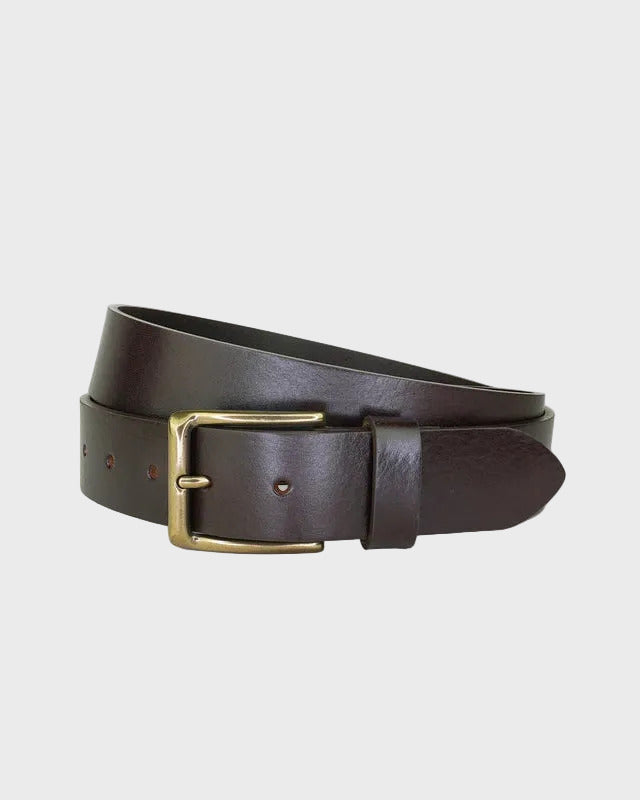 Brown leather belt with a brass buckle on a light gray background
