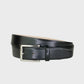 Black leather belt with a silver buckle on a light gray background