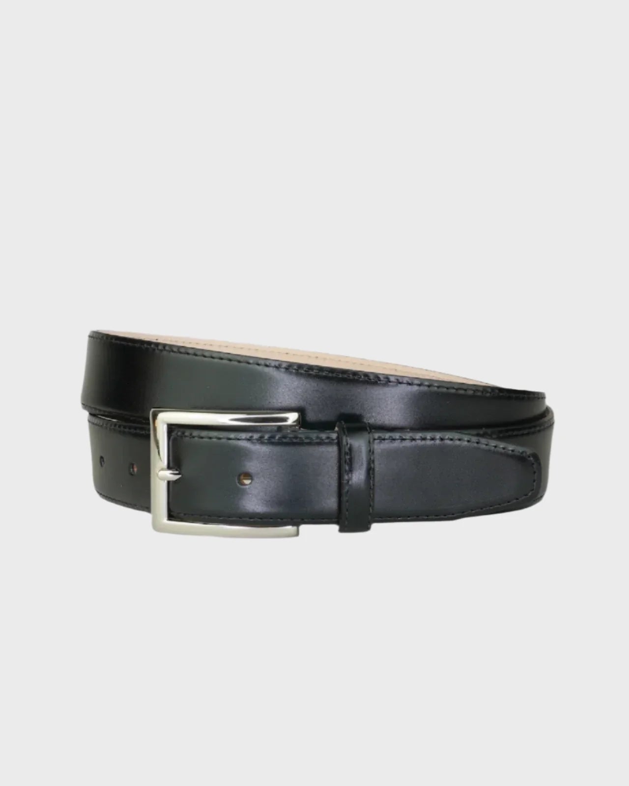 Black leather belt with a silver buckle on a light gray background