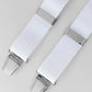 White braces with silver clips on a light gray background