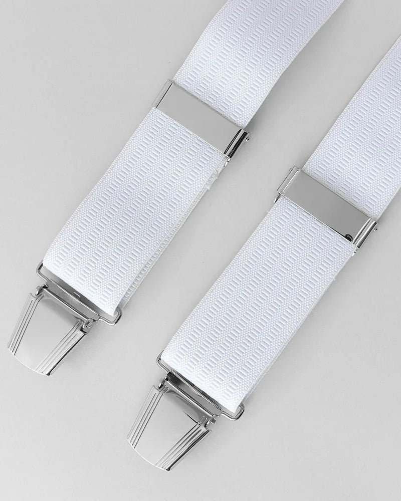White braces with silver clips on a light gray background
