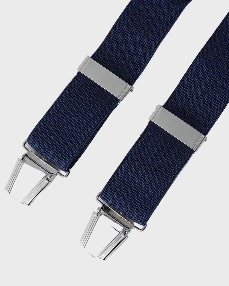 navy braces with silver clips on a light gray background