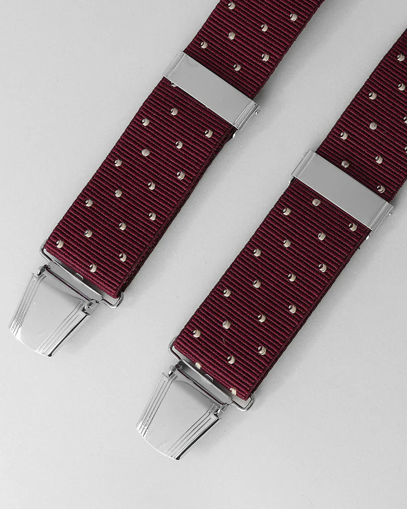 Burgundy braces on a light gray background