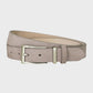 Taupe suede belt on a light gray background