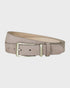 Taupe suede belt on a light gray background