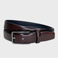 Brown leather belt with a silver buckle on a light gray background