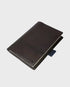 Dark brown leather notebook on a white background