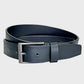 Black leather belt with a silver buckle on a light gray background