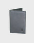 Navy leather wallet on a light gray background