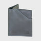 Navy leather wallet on a light gray background