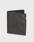 Brown leather wallet on a light gray background