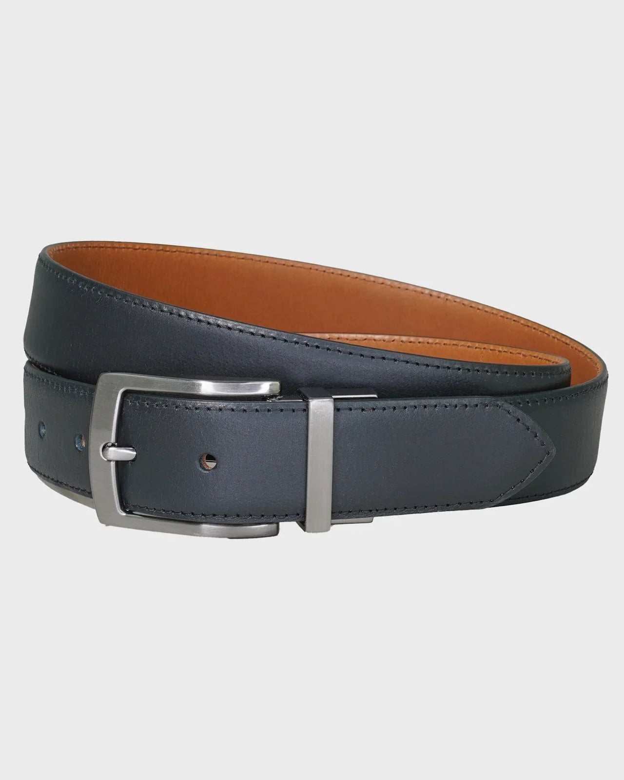Black and tan leather belt with a silver buckle on a light gray background