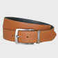 Tan leather belt with silver buckle on a light gray background