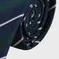 Rolled-up blue and green striped tie on a white background