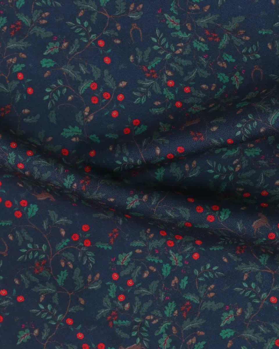 Navy fabric with red and green pattern