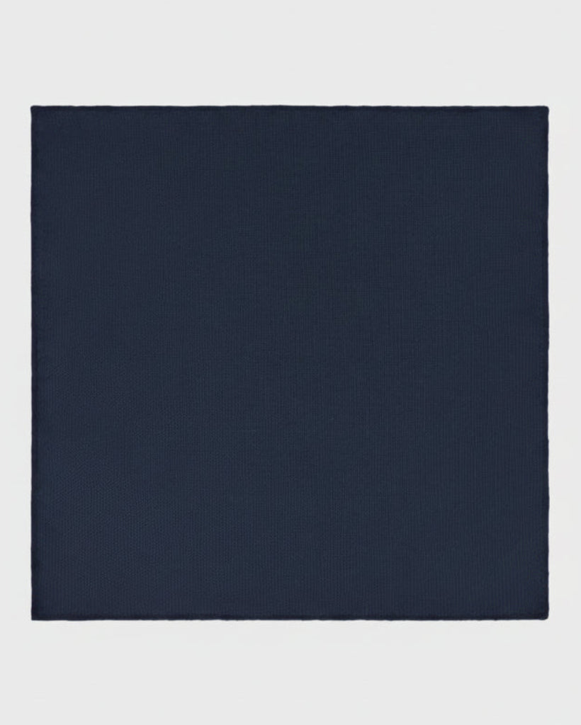 Navy blue hank on a light gray background