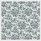 Patterned fabric with green leaves on a white background