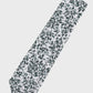 Patterned tie on a light gray background