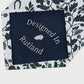 Navy lining with 'Designed In Rutland' text